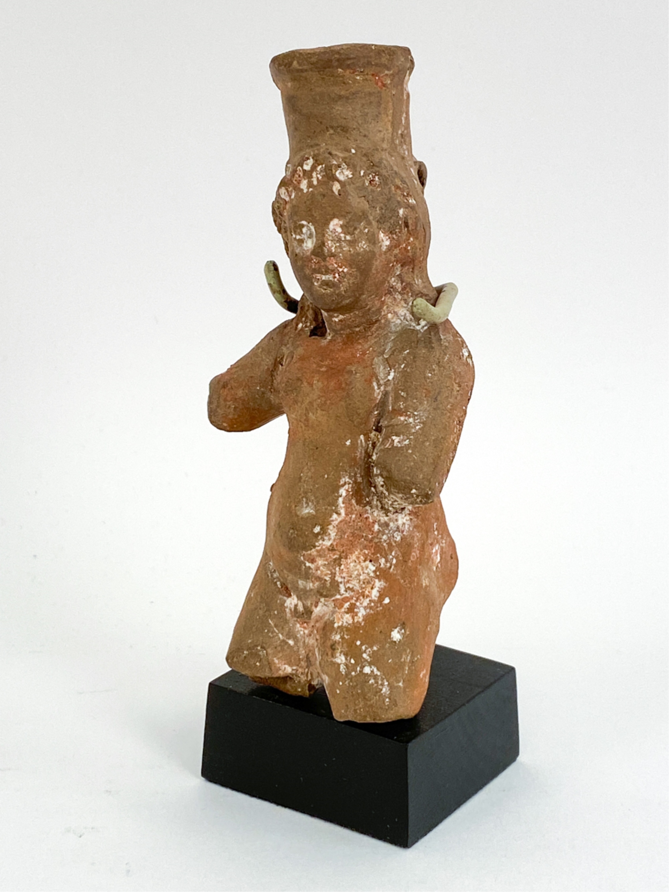 Egyptian School 1st Century | Terracotta of standing youth, wearing a ...