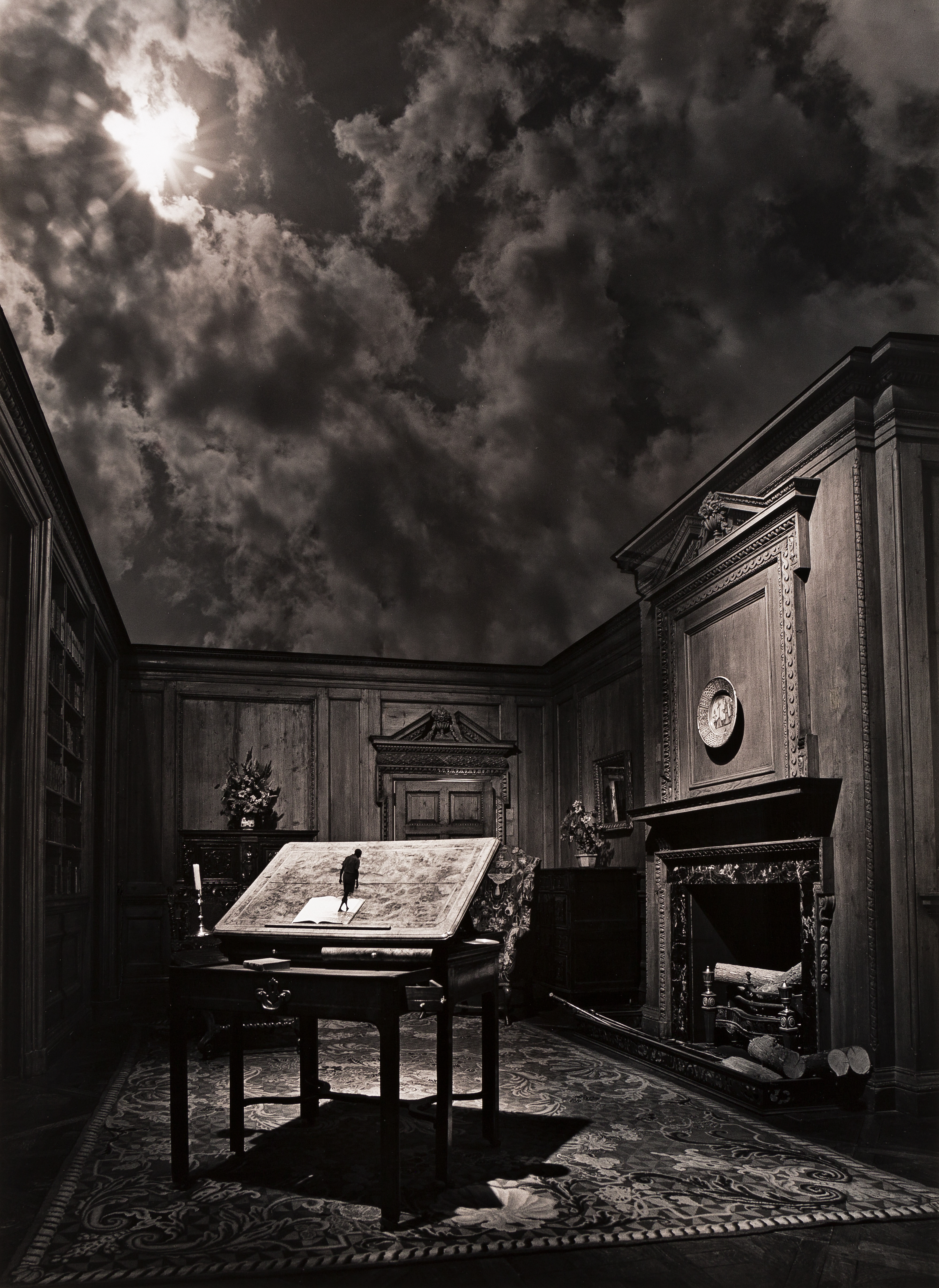 A surreal interior scene where a room's ceiling is replaced by a dramatic, cloudy night sky.