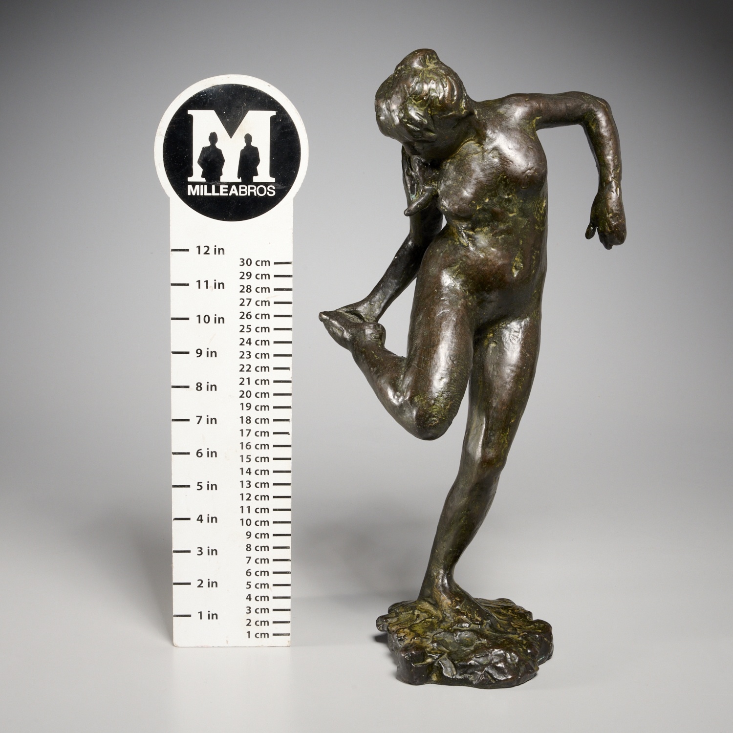 Artwork by Edgar Degas, "Danseuse regardant la plante de son pied droit" (Dancer looking at the sole of her right foot), Made of bronze