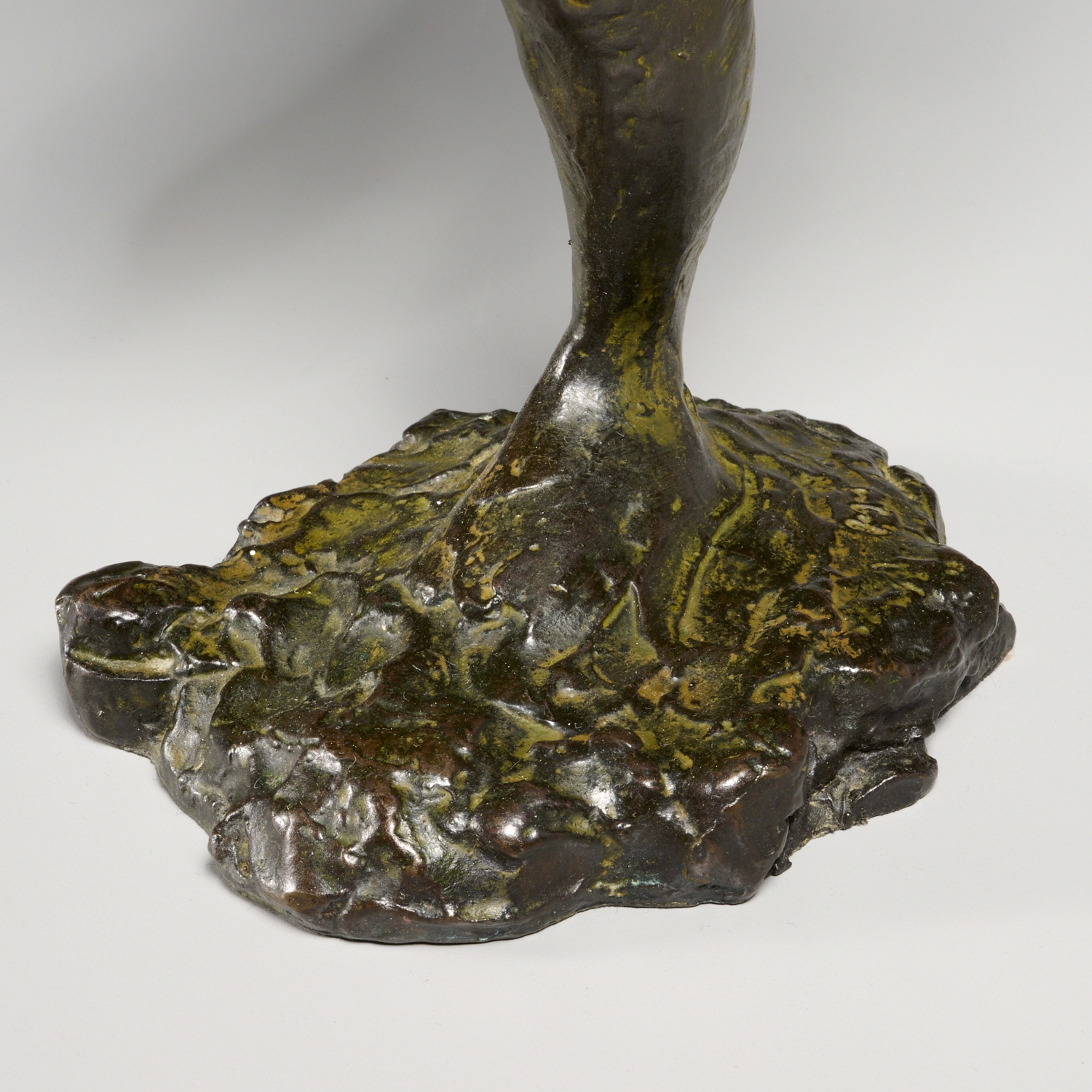 Artwork by Edgar Degas, "Danseuse regardant la plante de son pied droit" (Dancer looking at the sole of her right foot), Made of bronze