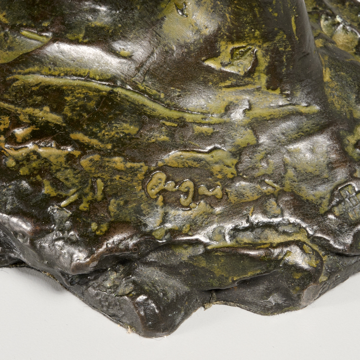 Artwork by Edgar Degas, "Danseuse regardant la plante de son pied droit" (Dancer looking at the sole of her right foot), Made of bronze