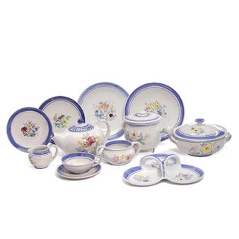 tableware decorated with white base glaze and polychrome glazed flower decor - Lars Syberg