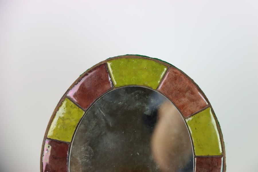 Mithé Espelt | Oval mirror in alternating brown and green ceramics ...