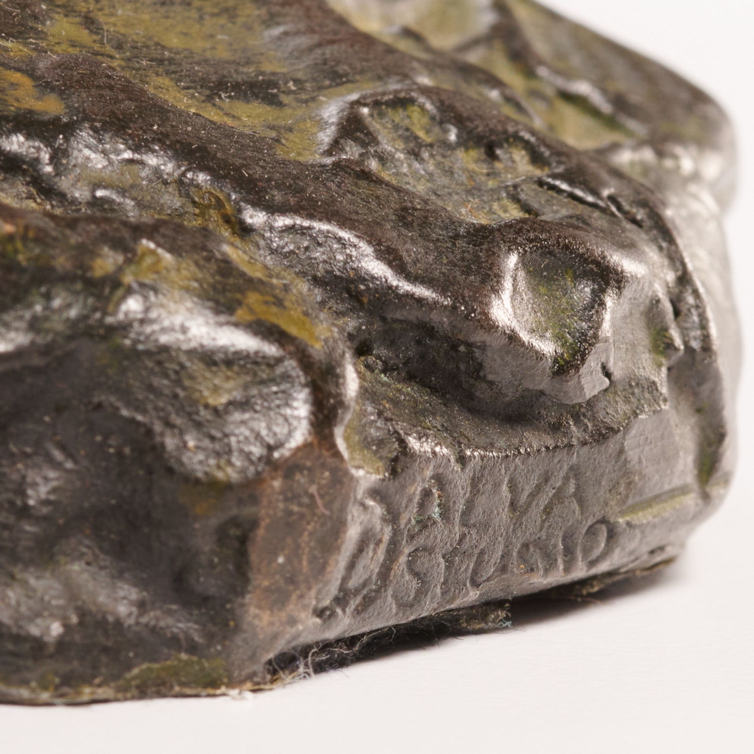 Artwork by Edgar Degas, "Danseuse regardant la plante de son pied droit" (Dancer looking at the sole of her right foot), Made of bronze