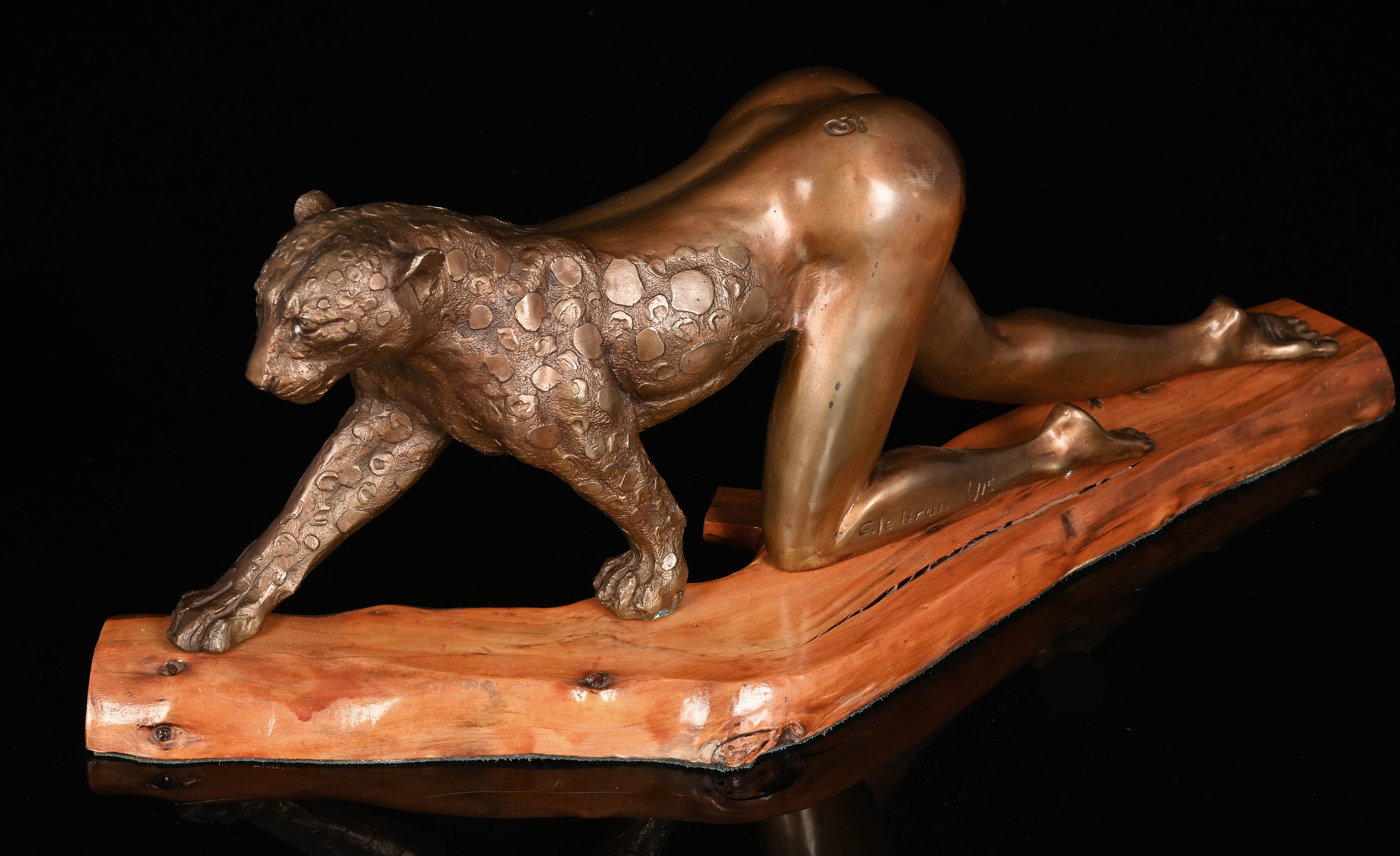 Artwork by Gile Brun, Anthropomorphic Woman Leopard, Made of bronze cast mounted on a wooden base
