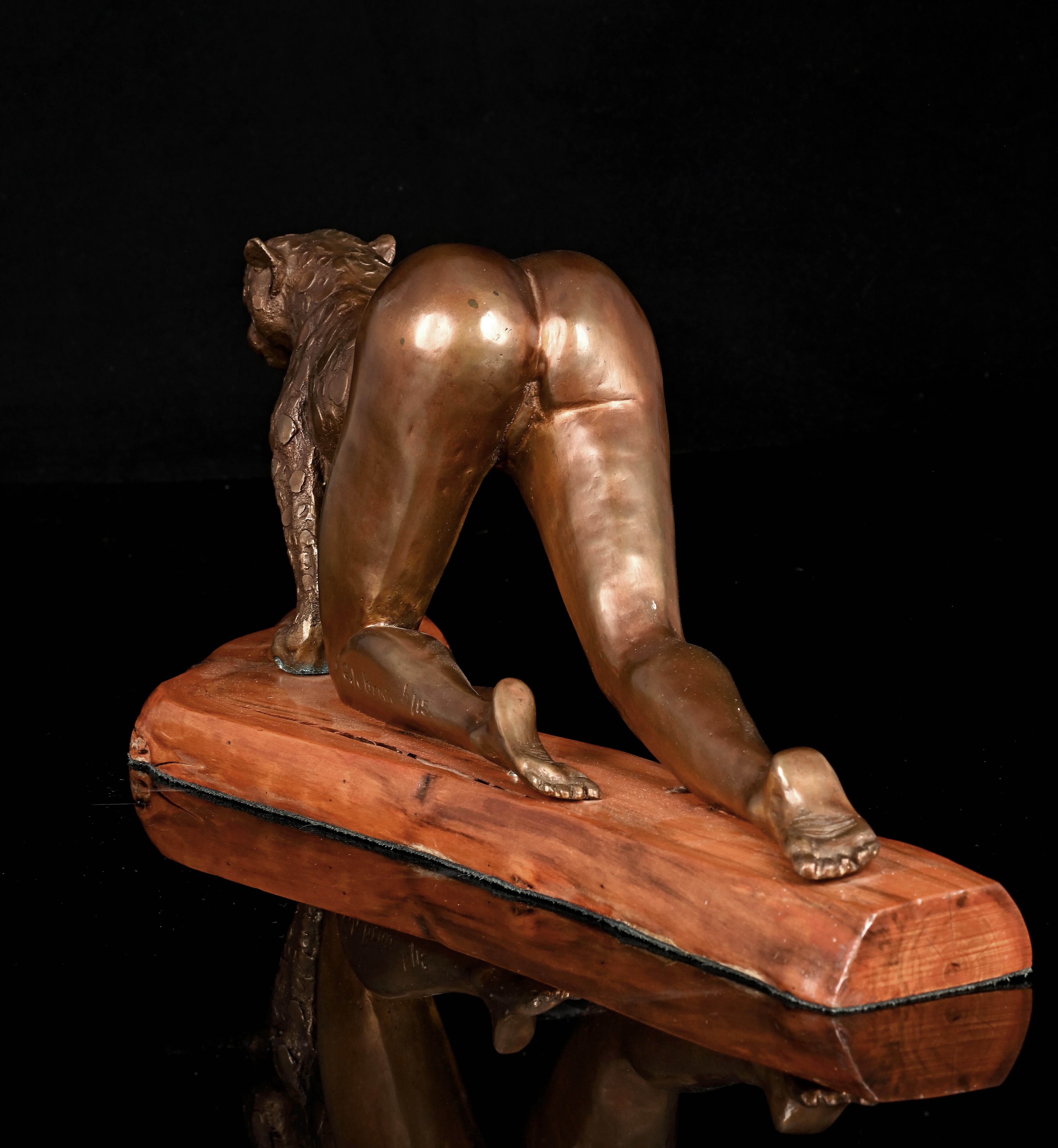 Artwork by Gile Brun, Anthropomorphic Woman Leopard, Made of bronze cast mounted on a wooden base