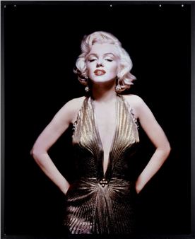 Marilyn Monroe wearing a sheer gold lamé travilla gown, in which she appeared briefly in : Gentlemen Prefer Blondes, and which she wore to receive Photoplay Magazine’s ‘Gold Star Award for the Fastest - Gene Kornman