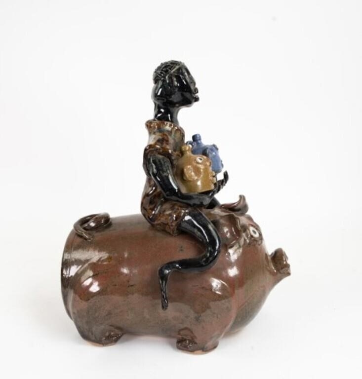 Marvin Bailey | folk pottery figure depicting a man riding a pig and ...