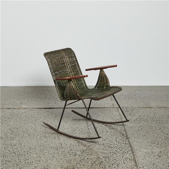 A Mid-Century Olive Plasticised Rattan Rocker In The Style Of John Crichton