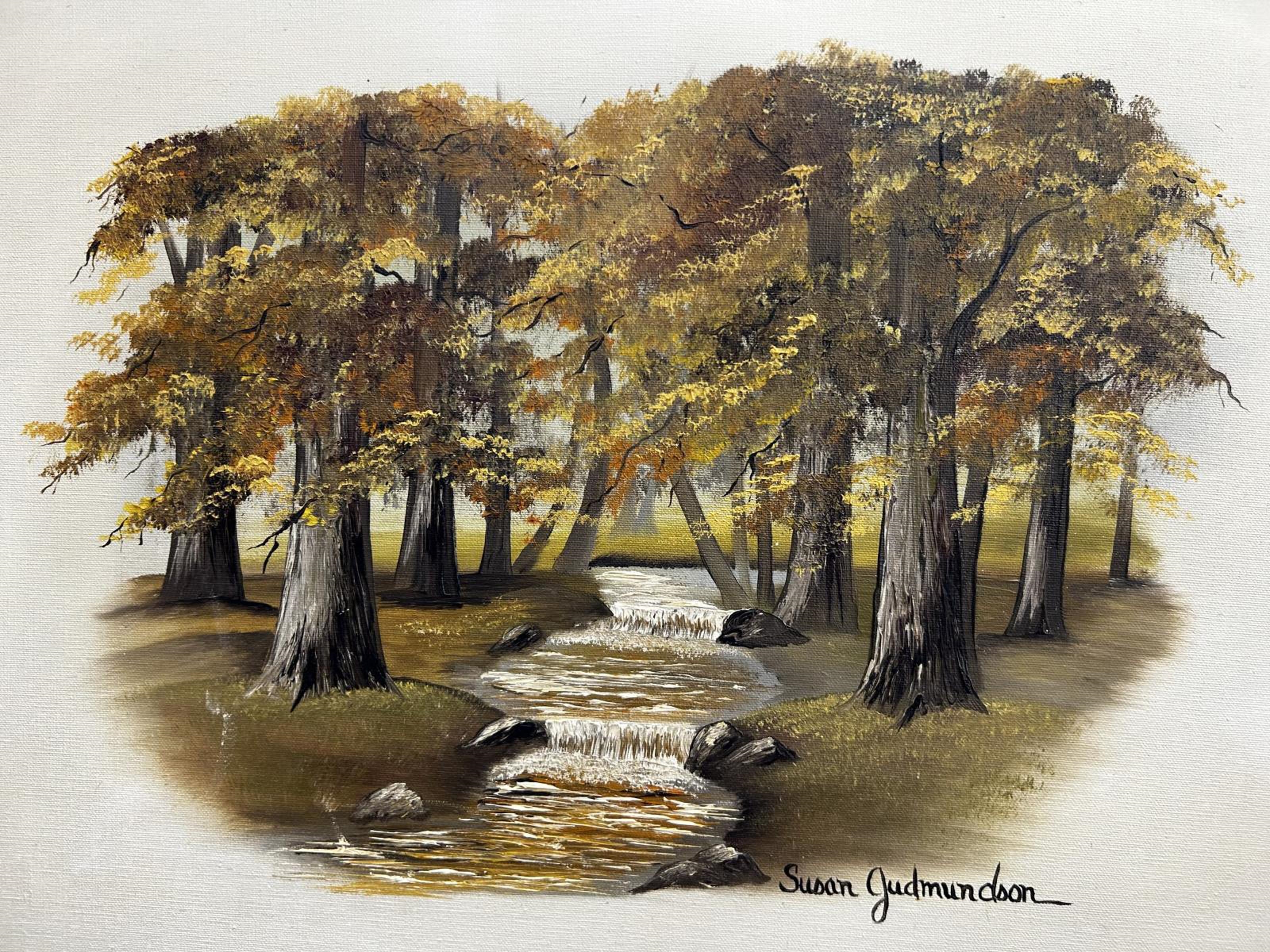 Artwork by Susan Gudmundson, Portraying a serene forest landscape adorned in the vibrant hues of autumn, Made of Oil on Canvas