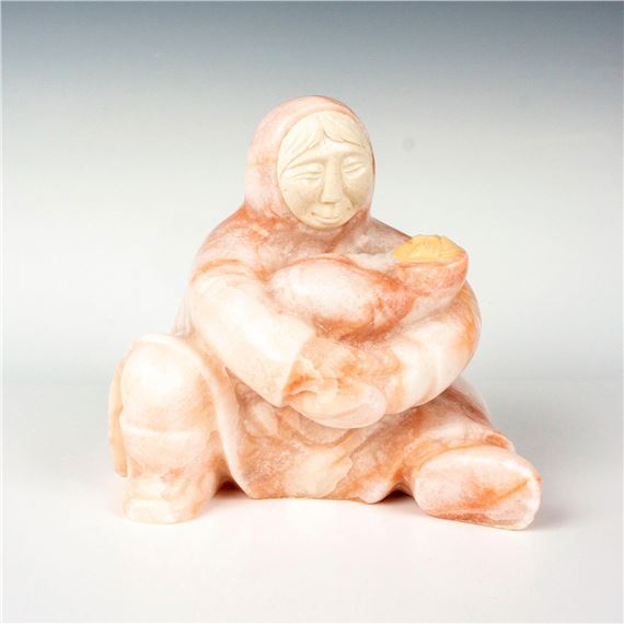 Inuit mother holding her child on her lap by Eddie Lee