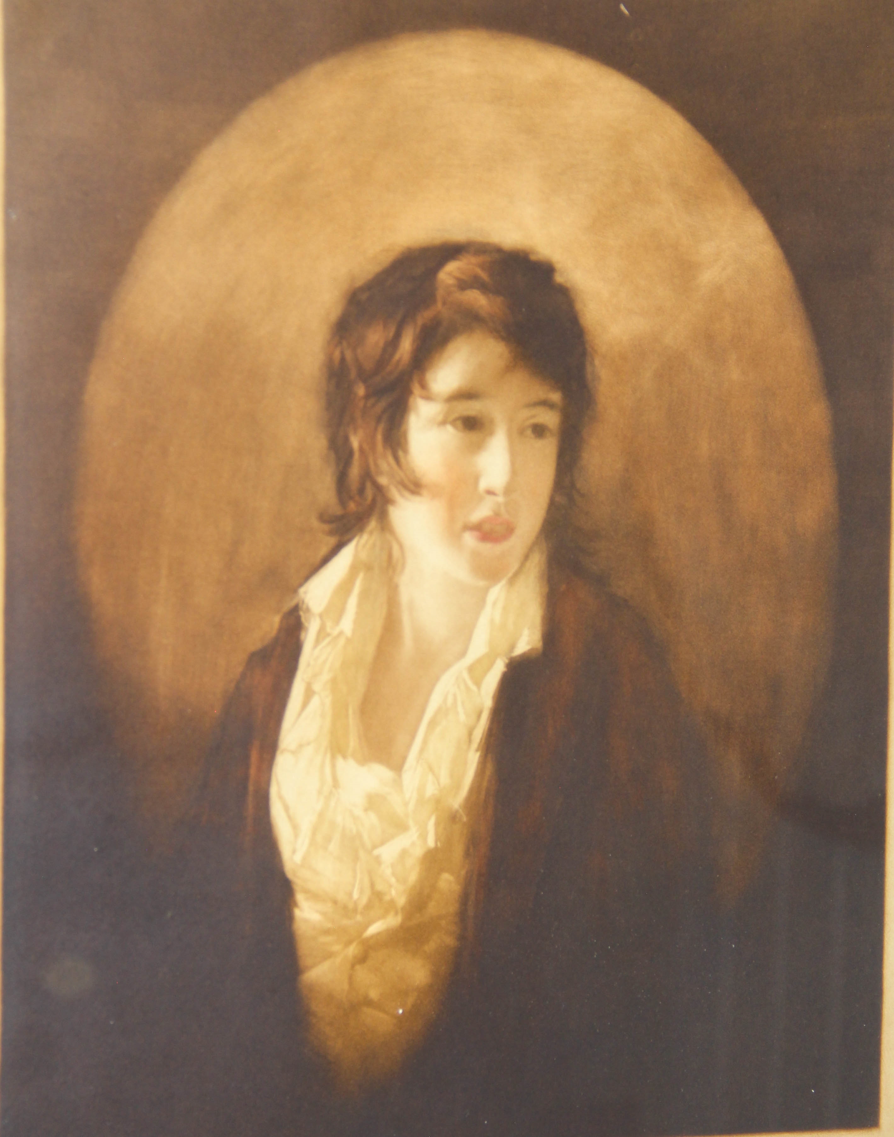 A framed portrait of a person with a golden halo against a dark background.