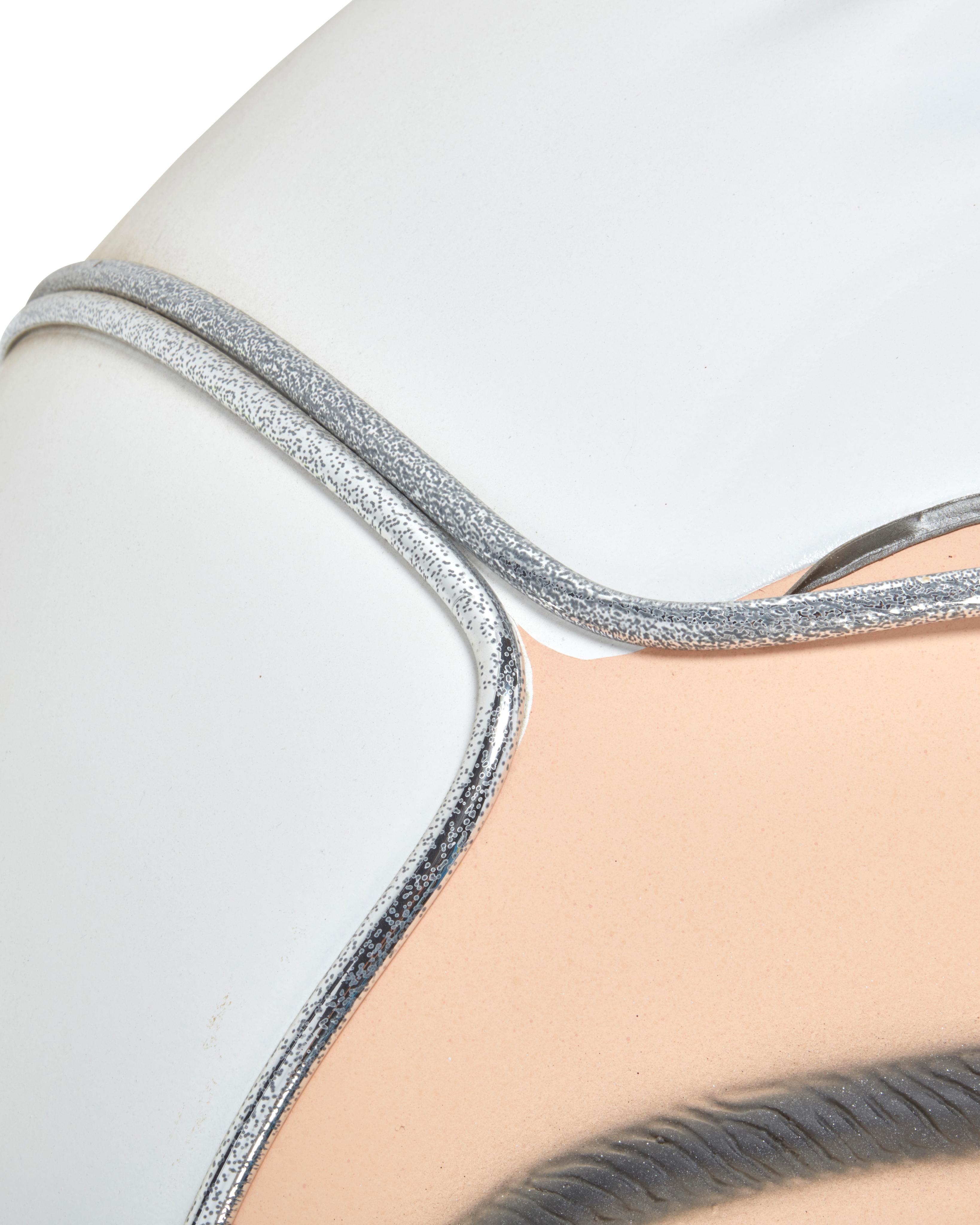 Artwork by Colin Christian, "Snackcake's Big Sci-Fi Head", Made of Fiberglass, acrylic