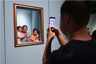 Exhibition Shows Portraits of Mothers