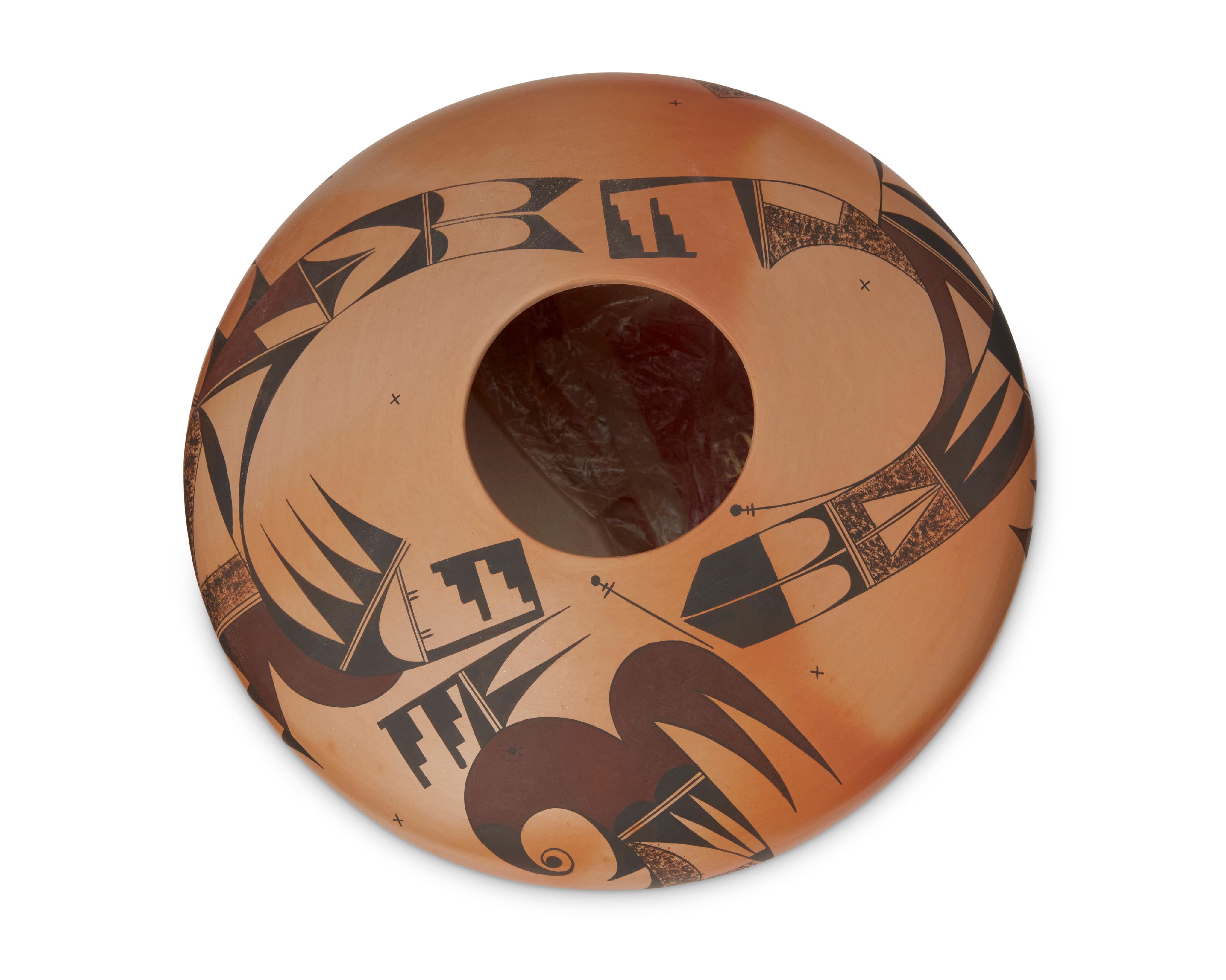 Artwork by Karen Abeita, A Hopi seed pot, Made of brown and black avian and geometric motifs on a terracotta wash ground