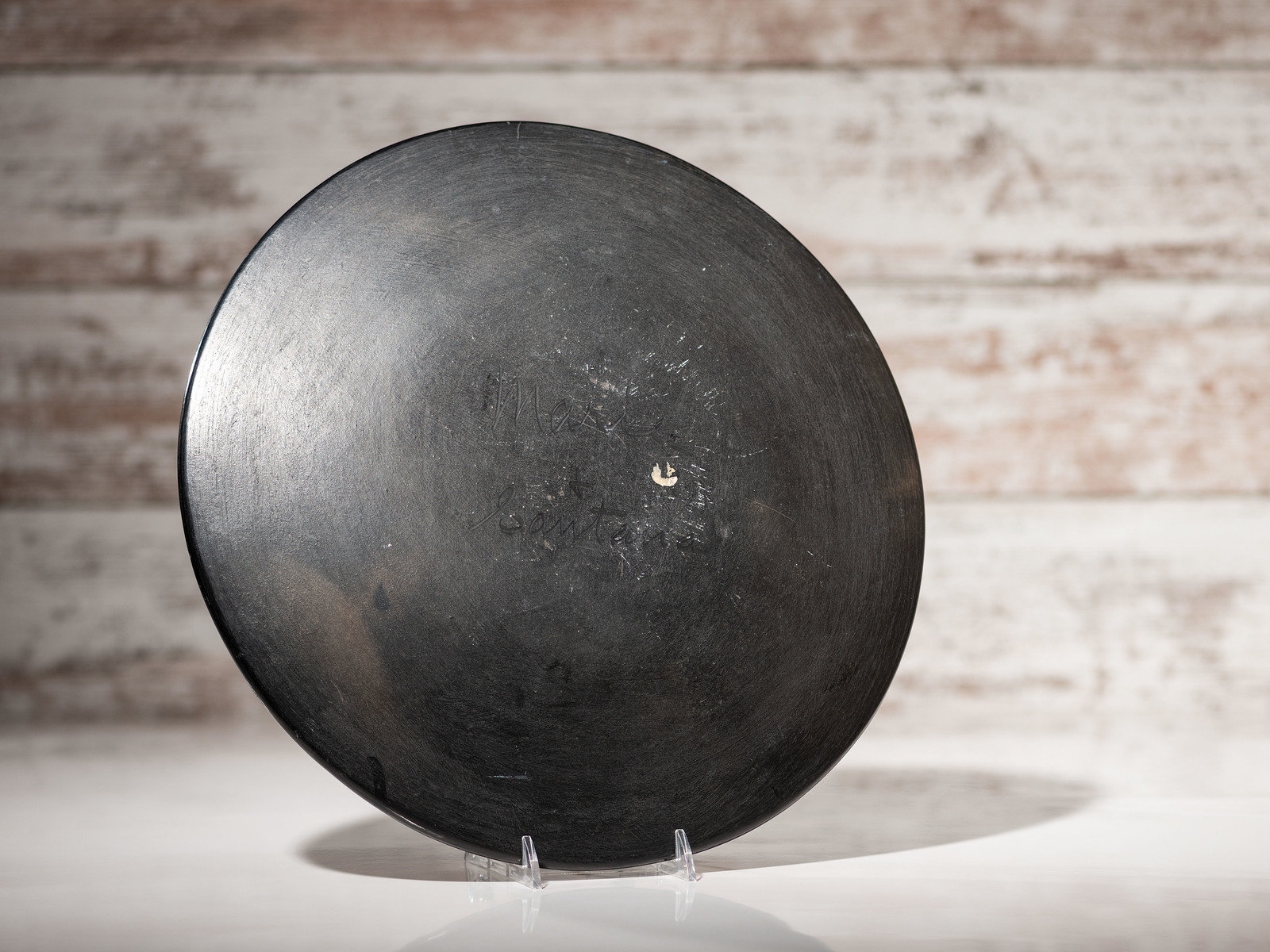 Artwork by Maria Montoya Martinez, Santana Roybal Martinez, Plate with Repeating Feathers, Made of Blackware Pottery