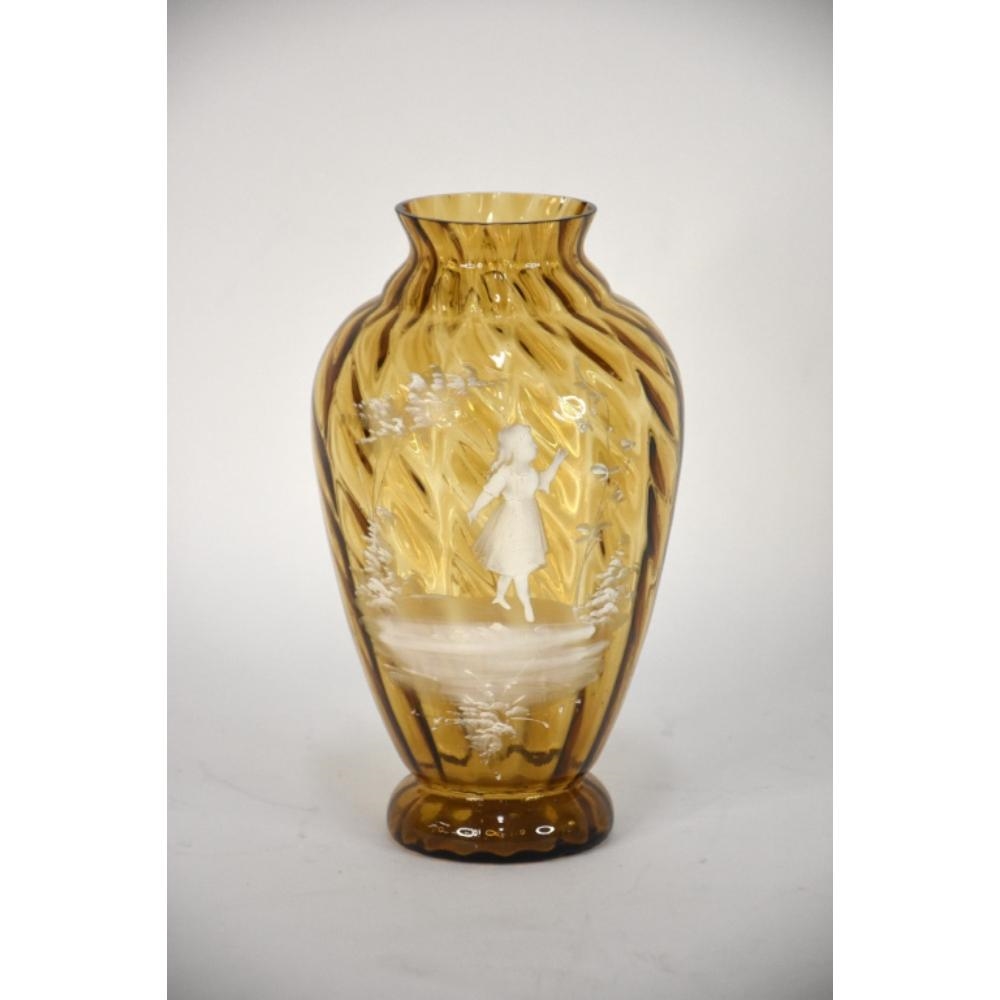 Artwork by Mary Gregory, A 19th Century Mary Gregory twist vase. Amber glass. 24.5cm tall., Made of Amber glass