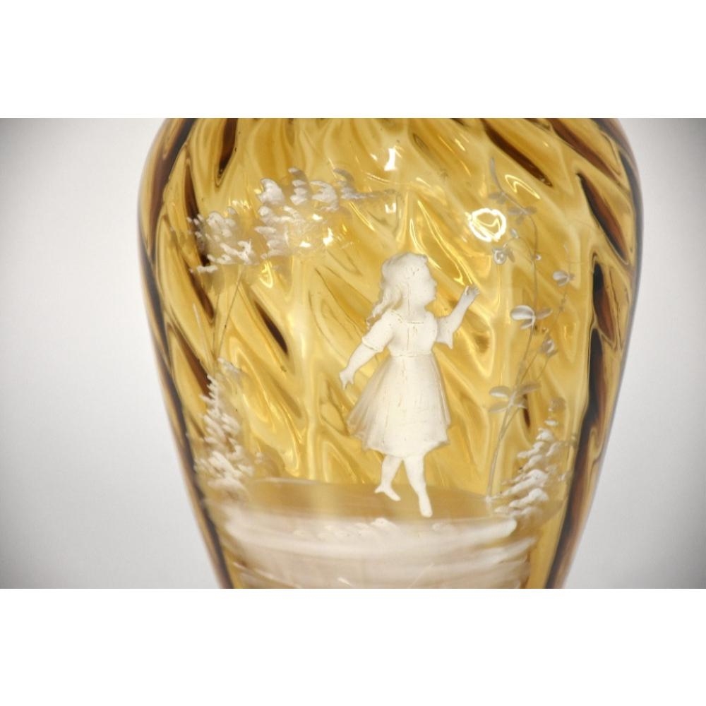 Artwork by Mary Gregory, A 19th Century Mary Gregory twist vase. Amber glass. 24.5cm tall., Made of Amber glass