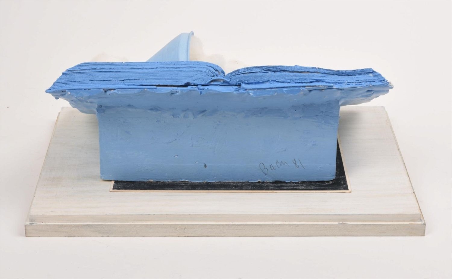 Artwork by Bruce Bacon, Plaster Sculpture of Book, Made of plaster in an acrylic box.