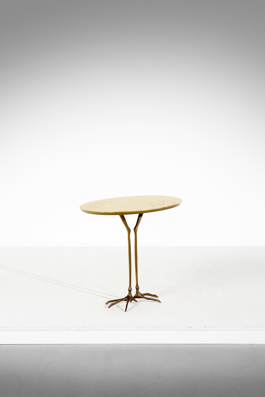 Artwork by Meret Oppenheim, Traccia coffee table for Simon, Made of Bronze and gilded wood