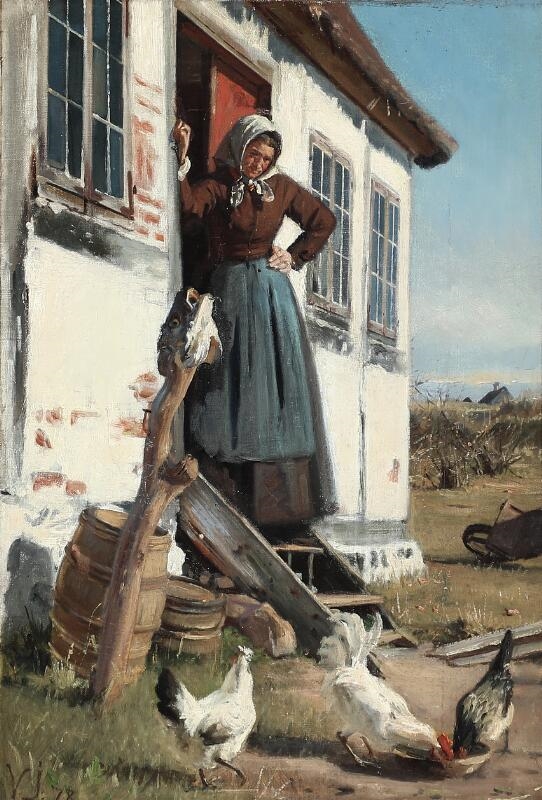 A woman feeding the chickens