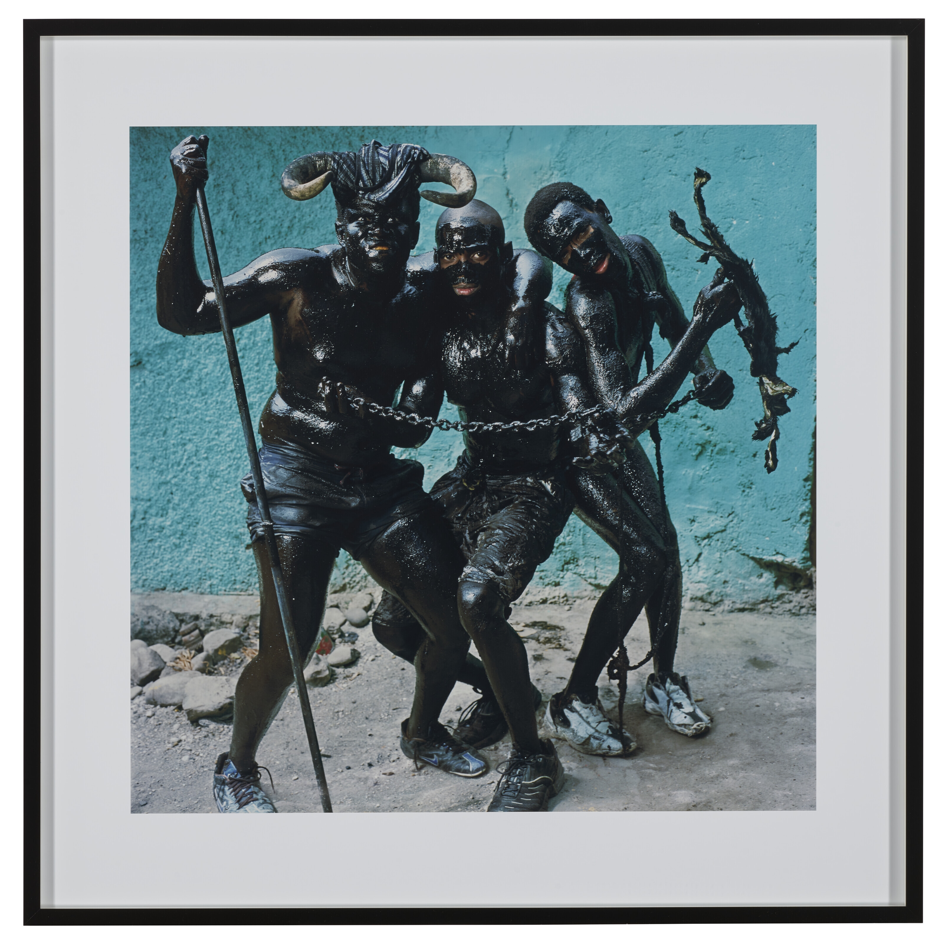 Artwork by Phyllis Galembo, Three Men with Chains, Jacmel, Haiti, 2004, Made of Ilfochrome print, flush-mounted on Dibond