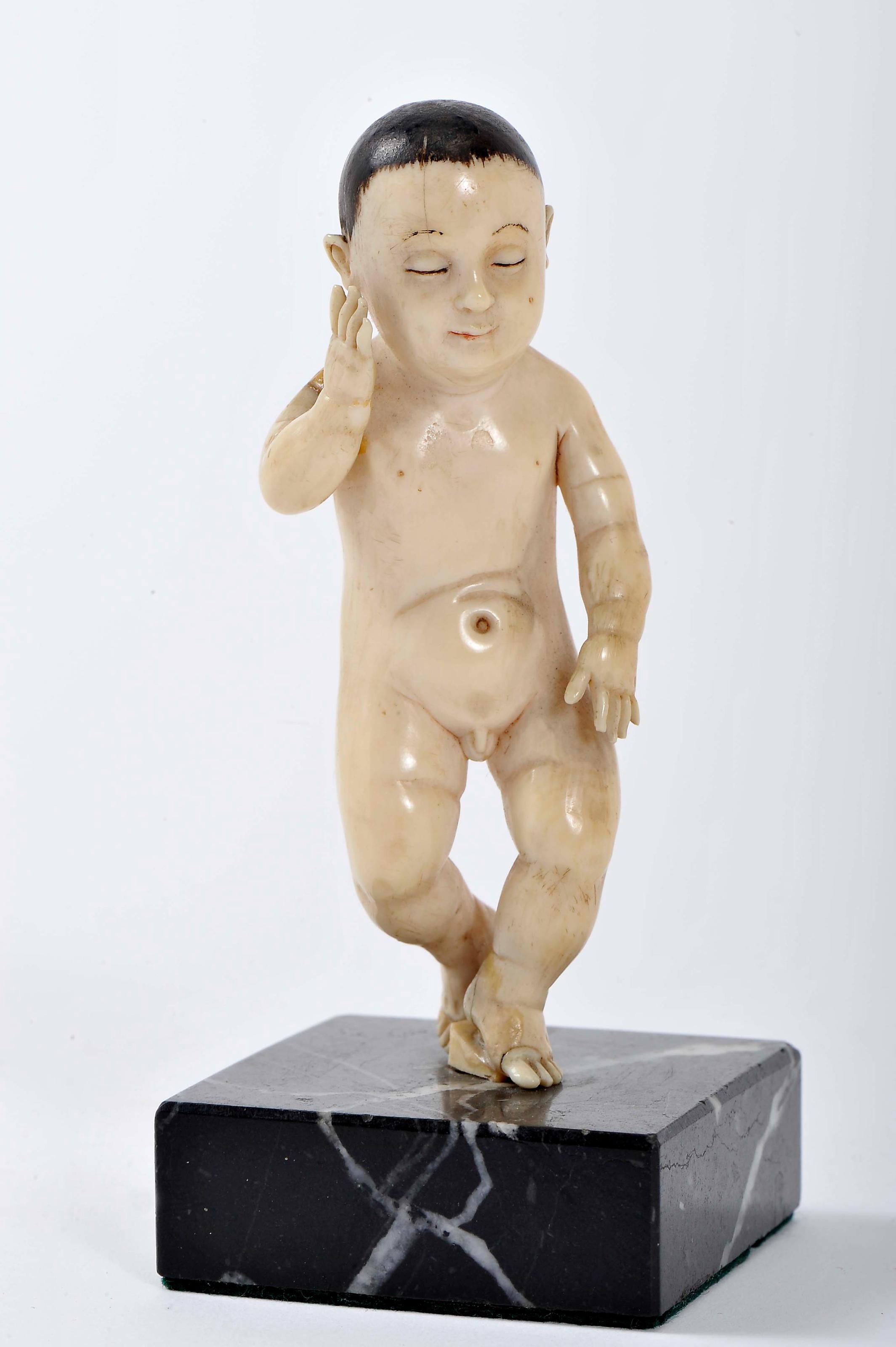 Artwork by Hispano-Portuguese School, 17th Century, Child Jesus lying down, Made of ivory