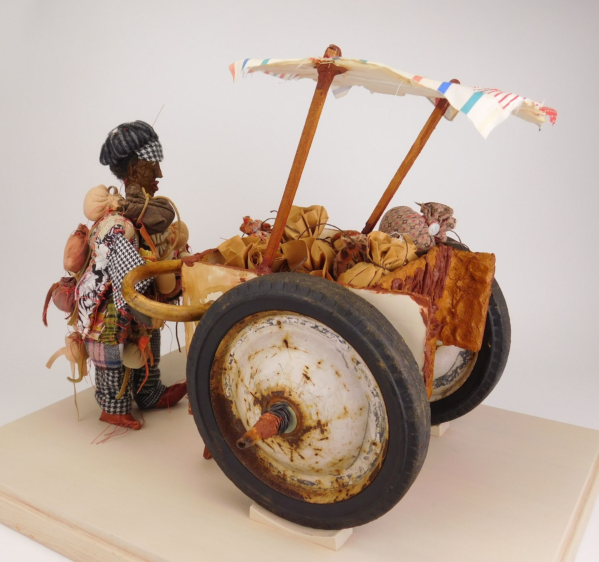 Artwork by Aminah Lynn Robinson, Brown Skin 5 cents, Made of mixed media