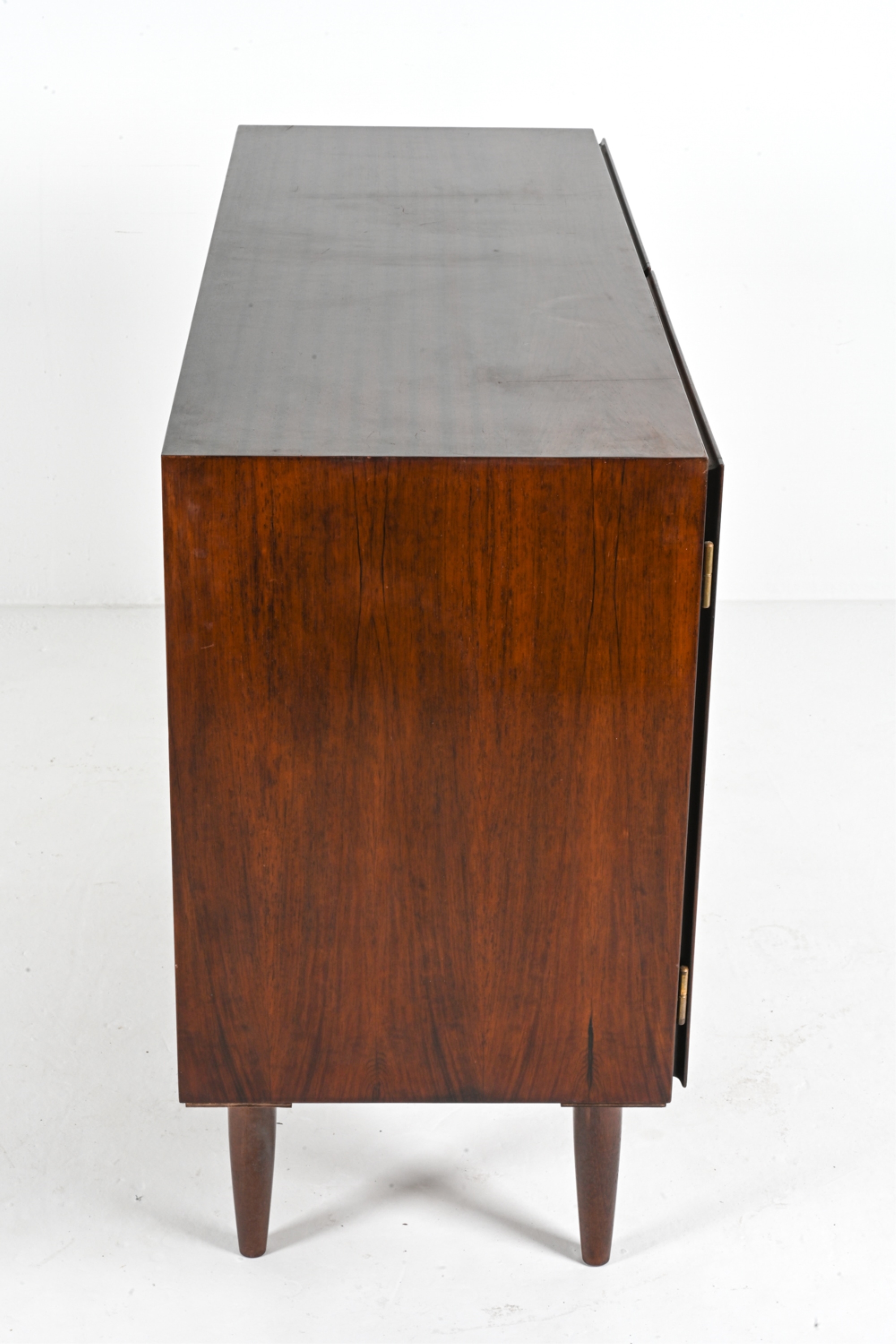 Artwork by Omann Jun, OMANN JUN ROSEWOOD SIDEBOARD CABINET, C. 1960'S, Made of rosewood