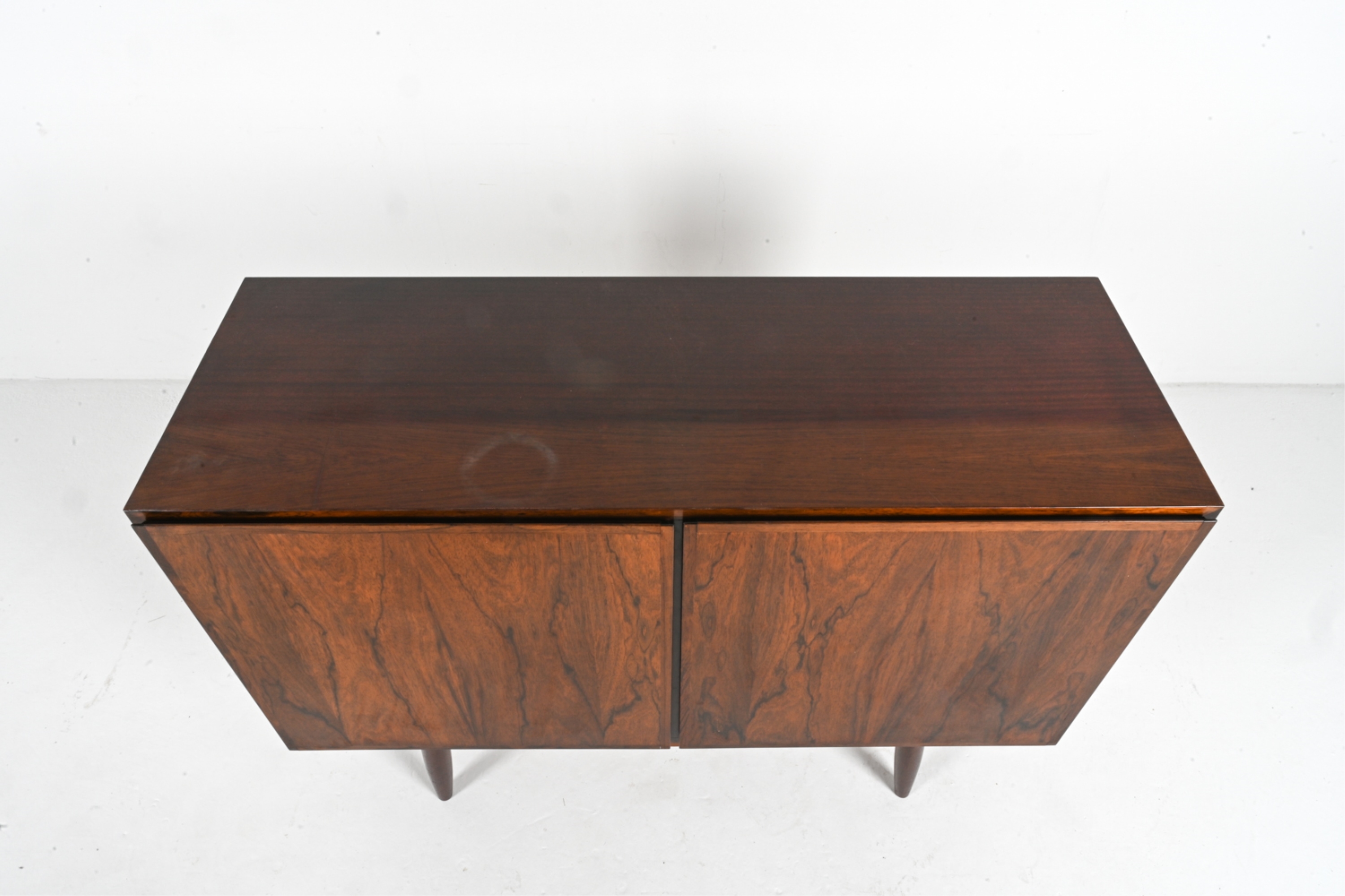 Artwork by Omann Jun, OMANN JUN ROSEWOOD SIDEBOARD CABINET, C. 1960'S, Made of rosewood