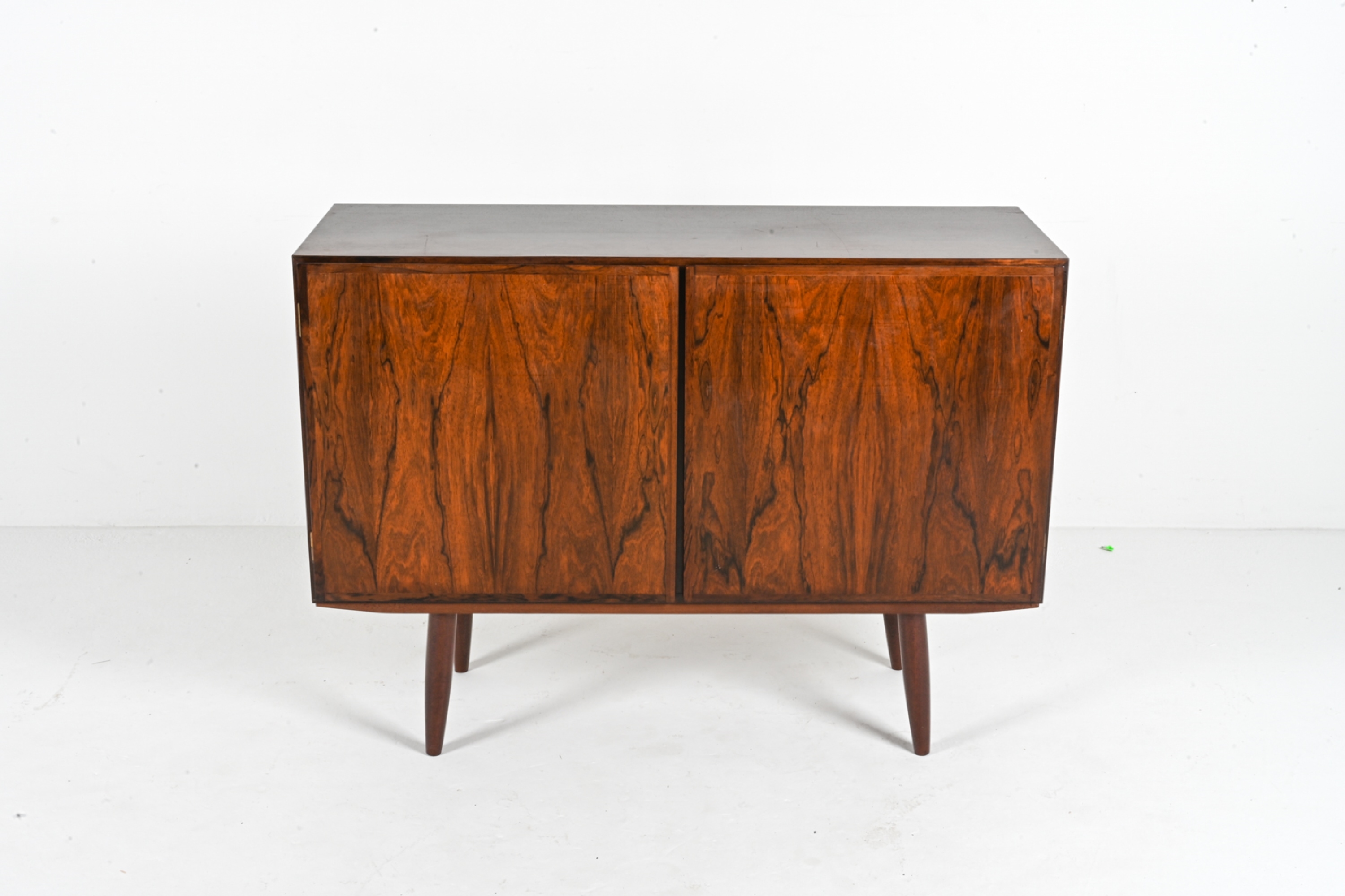 Artwork by Omann Jun, OMANN JUN ROSEWOOD SIDEBOARD CABINET, C. 1960'S, Made of rosewood