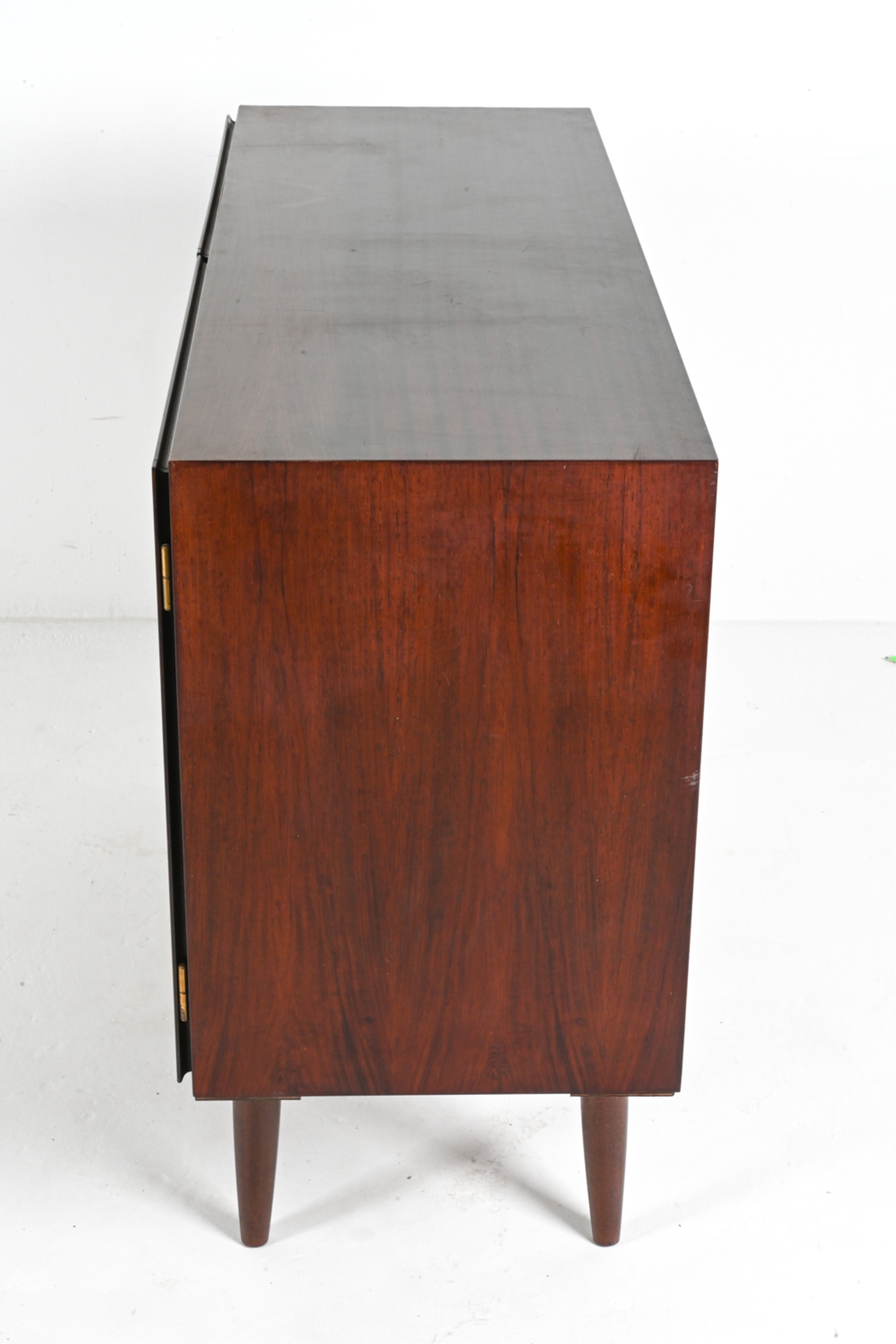 Artwork by Omann Jun, OMANN JUN ROSEWOOD SIDEBOARD CABINET, C. 1960'S, Made of rosewood