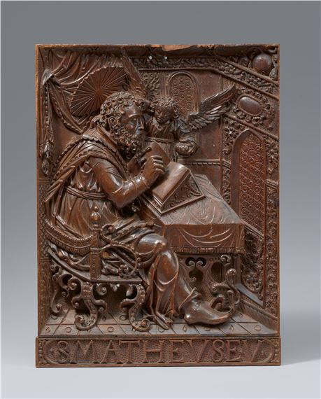 A carved wood relief of St Matthew, Bavaria - Hans Degler