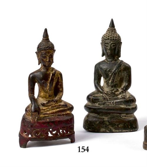 THAILAND - 19th century
Two bronze Buddha statuettes, one in dhyana mudra and one gold-lacquered in bhumisparsa mudra on an openwork throne.
Height: 17 and 17 cm by Thai School, 19th Century, 19th century