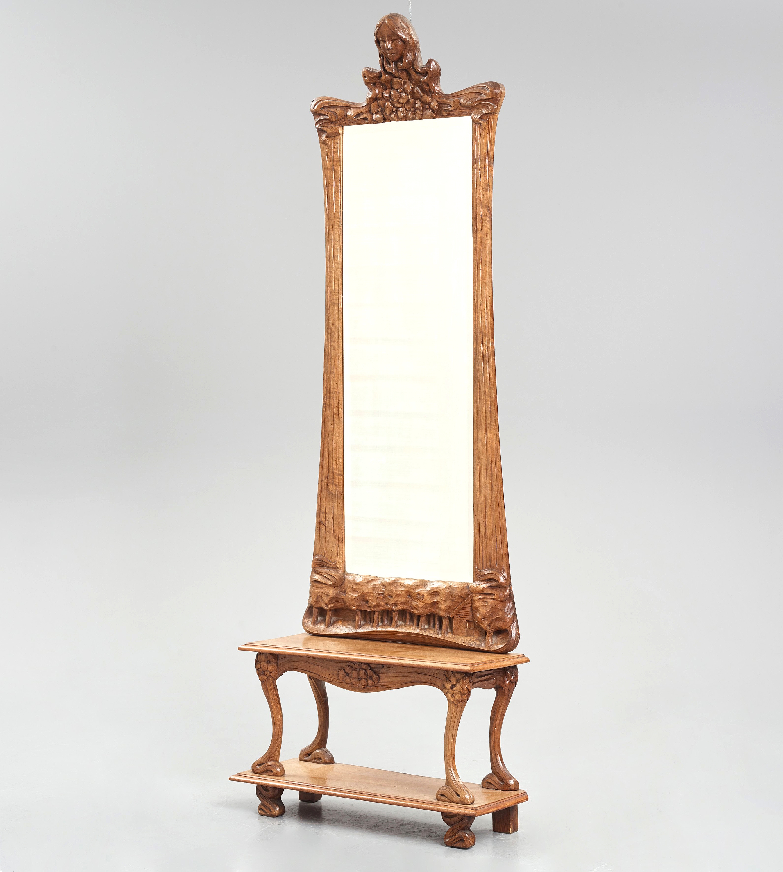 Artwork by Edvard Nilsson, an Art Nouveau sculptured mirror with table, Sweden , early 20thC., Made of mirror