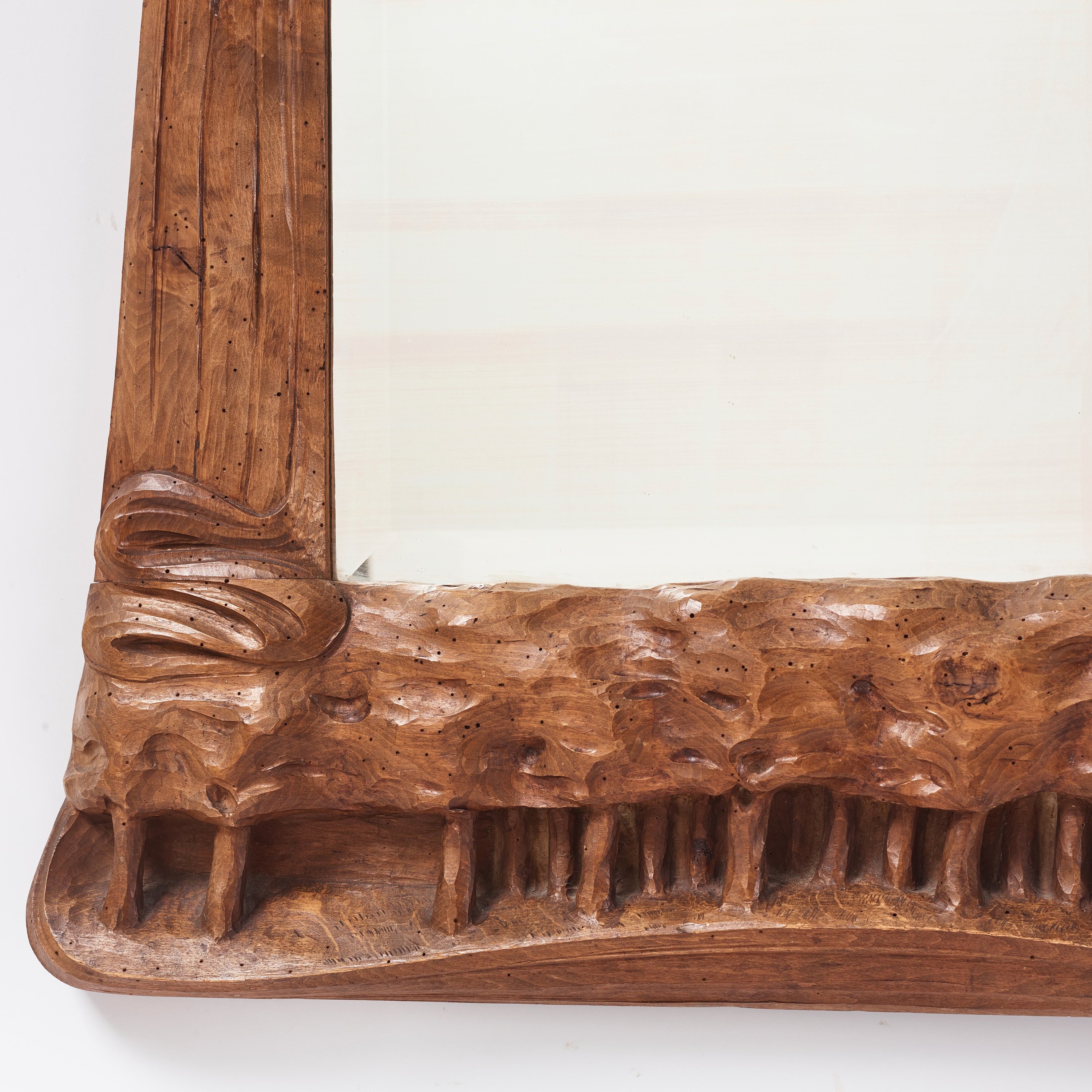 Artwork by Edvard Nilsson, an Art Nouveau sculptured mirror with table, Sweden , early 20thC., Made of mirror