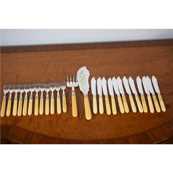 George Howson | A set of 12 English Sheffield fish knifes and forks ...