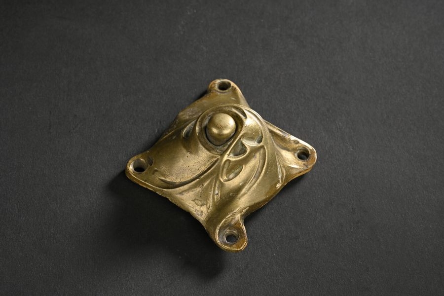 Hector Guimard | Patinated brass landing doorbell with turning and