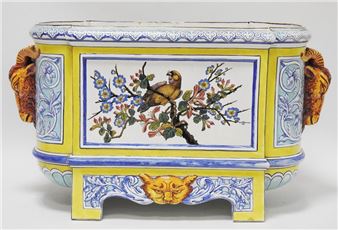 Importante jardinière de forme rectangulaire à bords cintrés, prises simulées formant mufles de béliers - Jehanne Gondoin