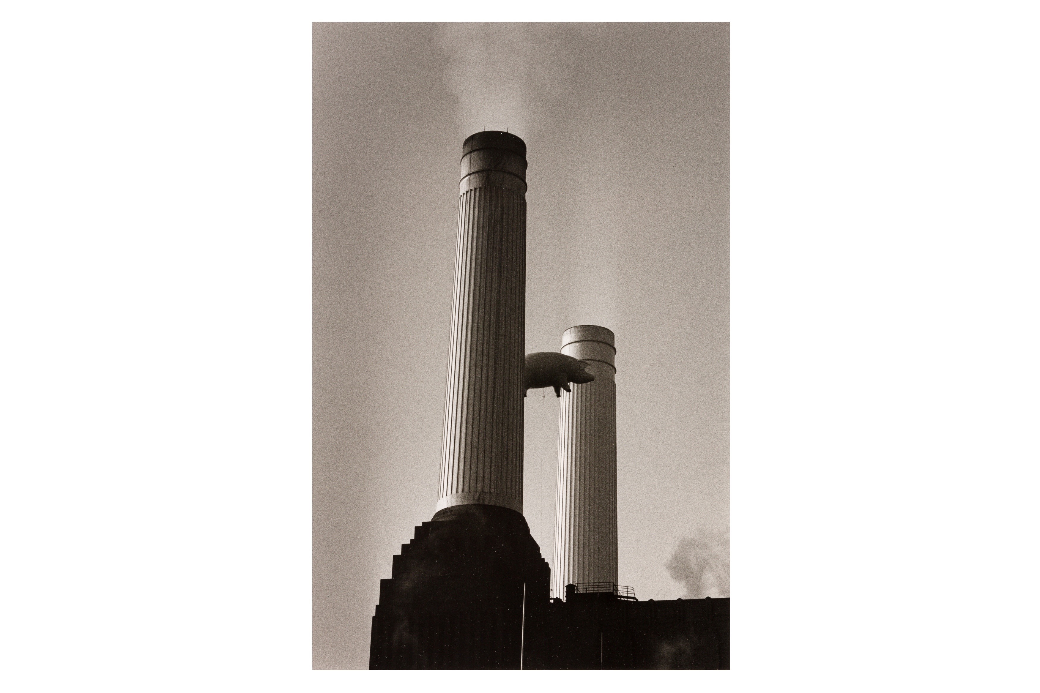 Artwork by Carinthia West, PINK PIG OVER BATTERSEA POWER STATION, Made of Silver gelatin print