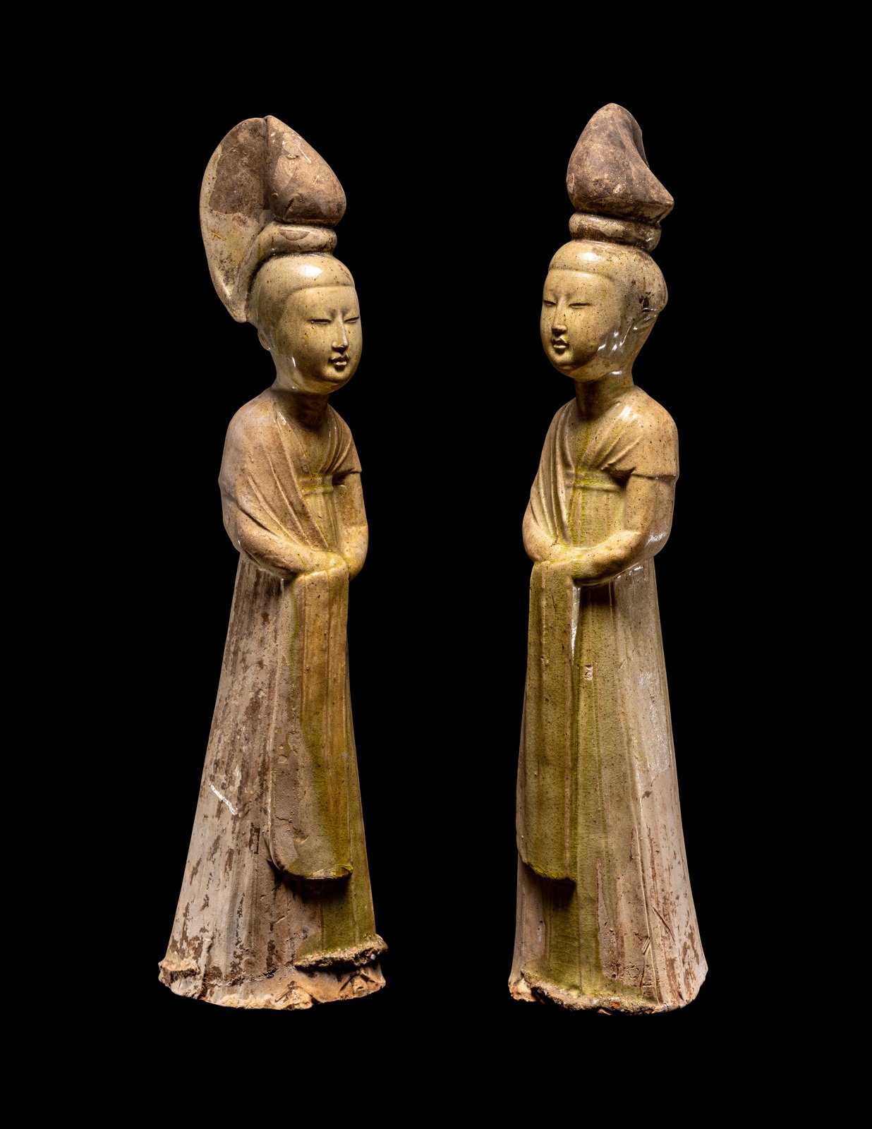 Chinese School, Two large Chinese grey pottery figures of courtiers Han  dynasty Each modelled standing wearing long heavy robes