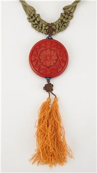 Macramé and cinnabar necklace- intricately woven necklace with a carved cinnabar round pendant - Simone Samuels
