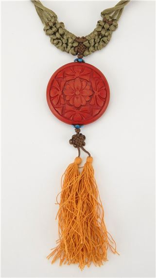 Macramé and cinnabar necklace- intricately woven necklace with a carved cinnabar round pendant - Simone Samuels