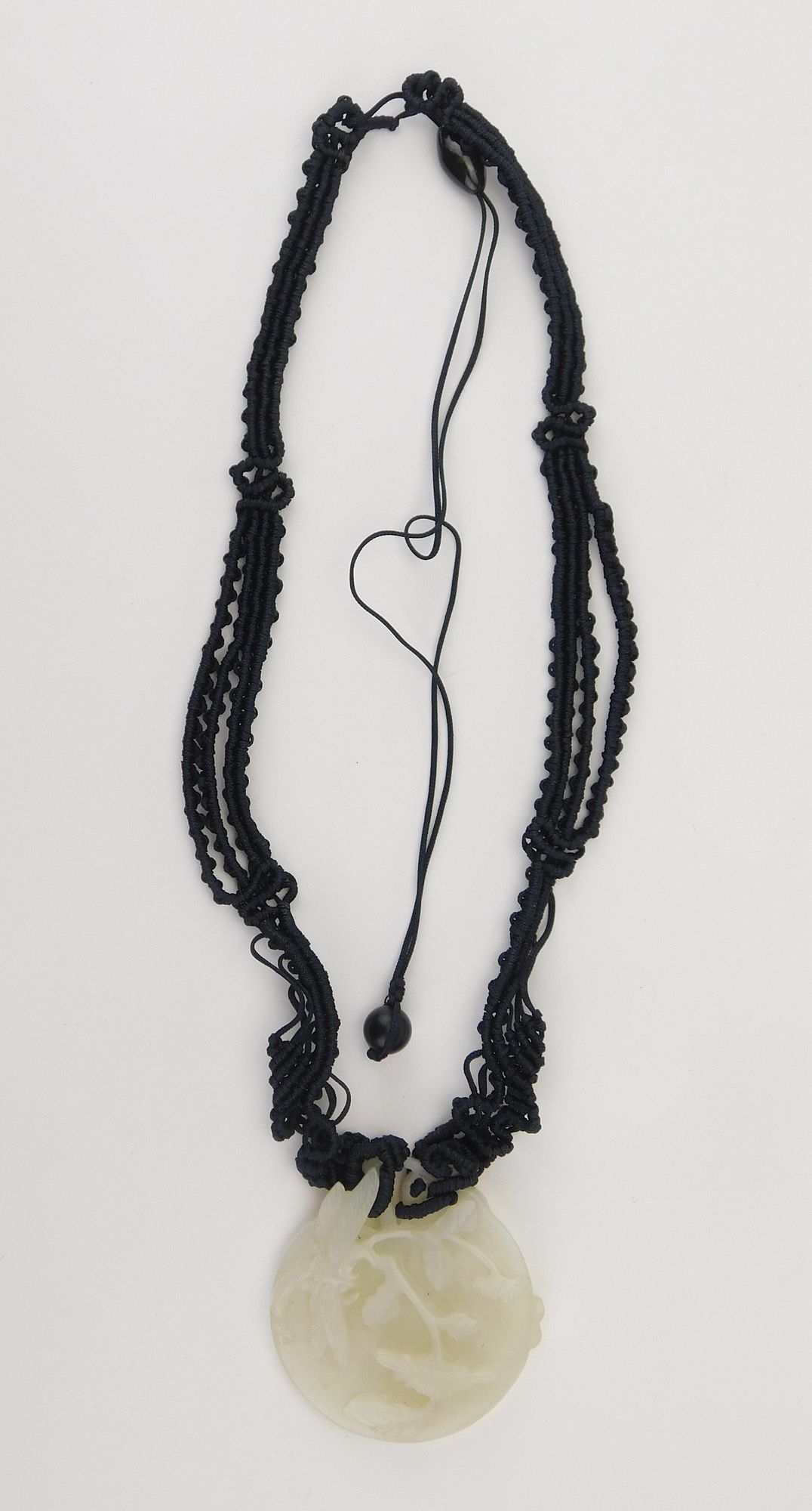 Artwork by Simone Samuels, Simone Samuels necklace, Made of carved white jade