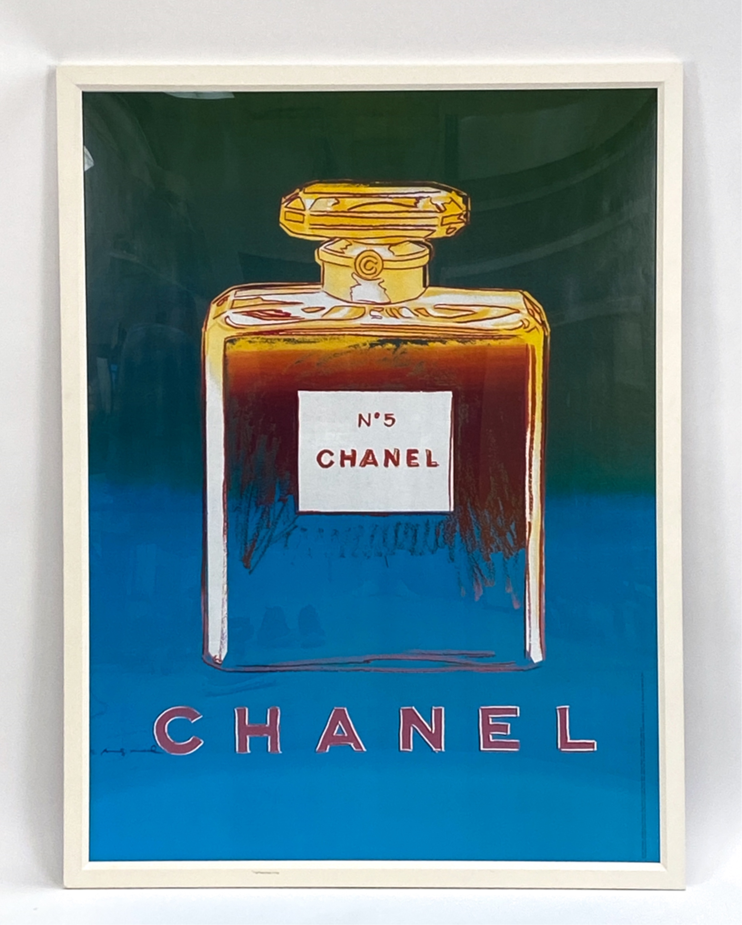 A painting of a chanel perfume bottle on a blue background.