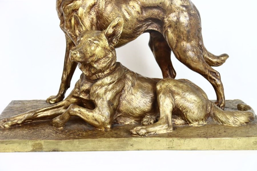 Artwork by Charles Paillet, Gilt patina bronze group featuring two dogs, Made of gilt patina bronze
