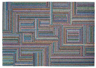 A colorful woven textile featuring a complex geometric maze pattern.