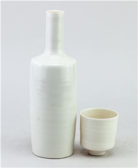 a tall translucent porcelain sake bottle - Andy Shore