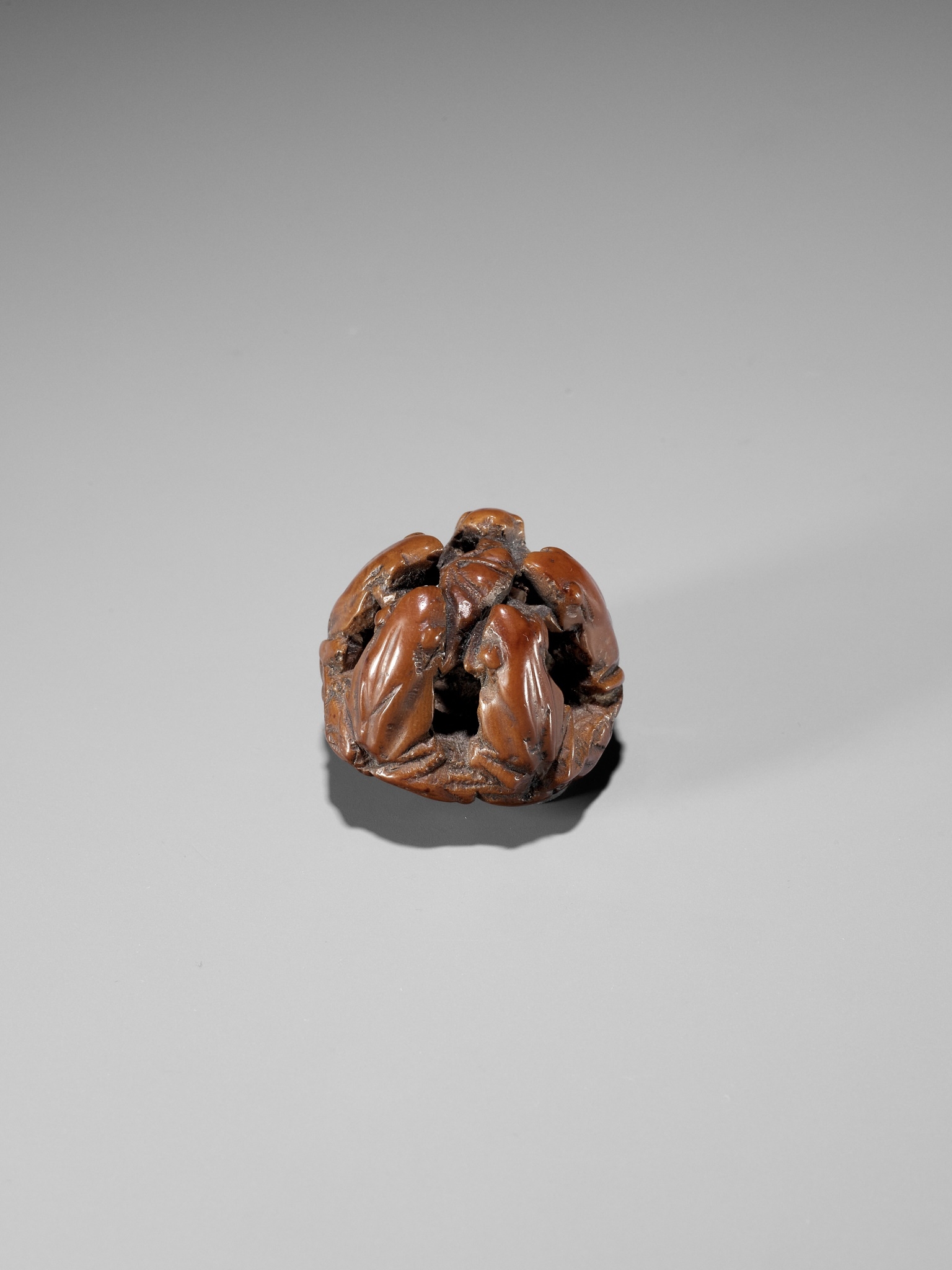 Seimin Chû | A RARE NUT NETSUKE OF FIVE FROGS ON A LOTUS LEAF ...