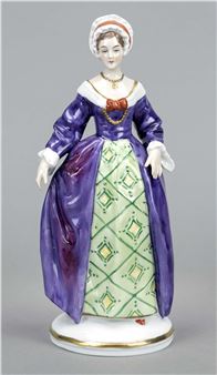 A porcelain figurine of a woman in an 18th-century style dress with purple and green colors.